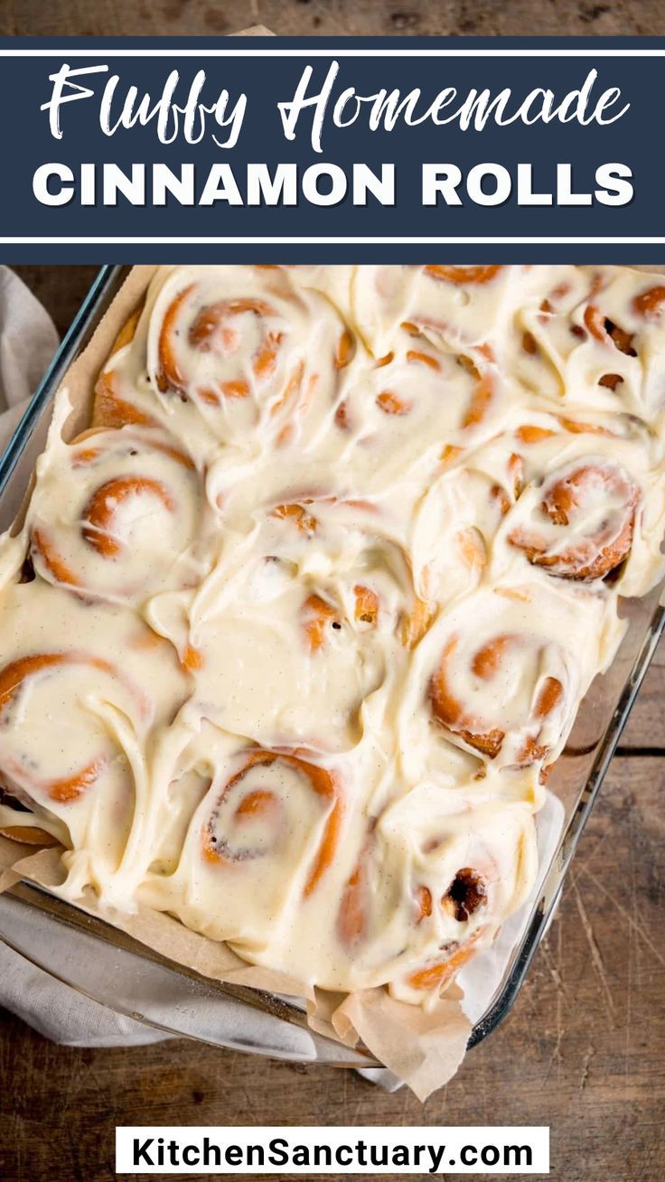 a pan filled with homemade cinnamon rolls on top of a wooden table and text overlay reads fluffy homemade cinnamon rolls