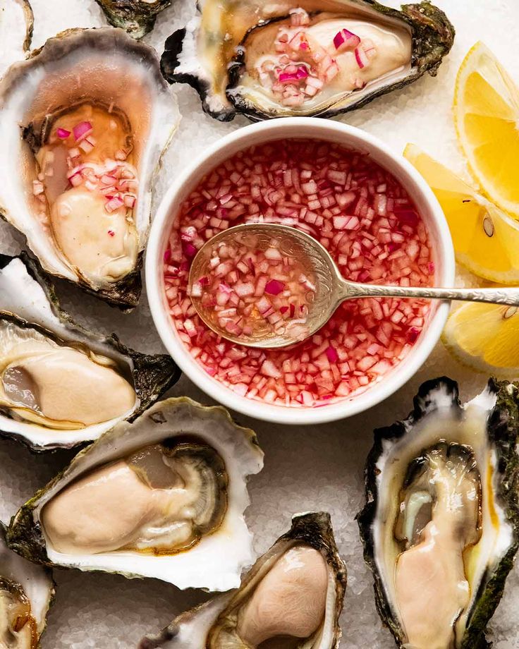 oysters on the half shell with dipping sauce