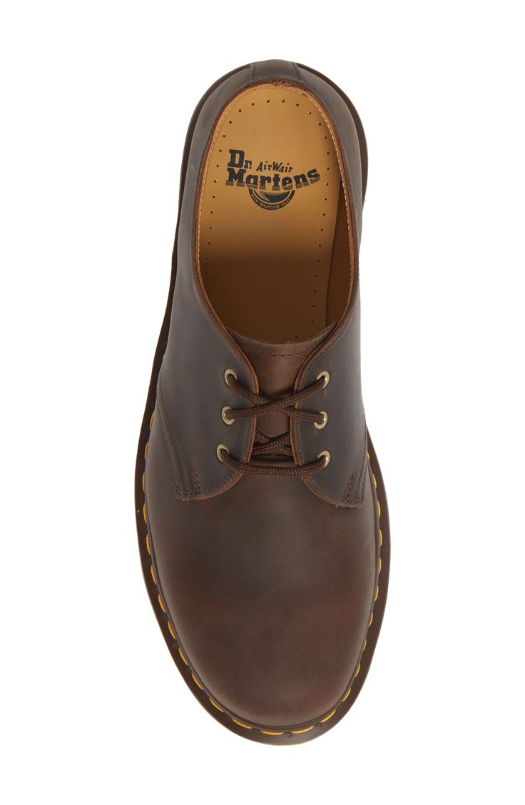 A signature sole grounds this bold derby crafted from hearty leather and fitted with air cushioning for comfort. Style Name:Dr. Martens Plain Toe Derby (Men). Style Number: 452515. Leather-lined Low-top Oxfords For Derby, Casual Leather Oxfords For Work, Rugged Leather Oxfords With Round Toe, Workwear Derby Shoes With Stitched Sole In Calf Leather, Calf Leather Derby Shoes With Stitched Sole For Work, Casual Leather Lace-up Derby Shoes, Casual Oxfords With Leather Footbed For Derby, Derby Shoes With Stitched Sole For Work, Rugged Leather Shoes For Business