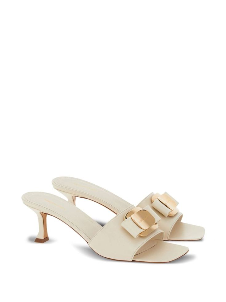 Ferragamo 55mm bow-detailing Leather Mules  - Farfetch Luxury Beige Mules For Formal Occasions, Elegant Gold Mules With Buckle Closure, Elegant Leather Mules With Rectangular Buckle, Elegant Formal Mules With Rectangular Buckle, Chic Heels With Gold-tone Hardware And Square Toe, Luxury Beige Mules For Evening, Chic Square Toe Heels With Gold-tone Hardware, Evening Sandals With Square Toe In Cream, White Mules With Buckle Closure For Formal Occasions