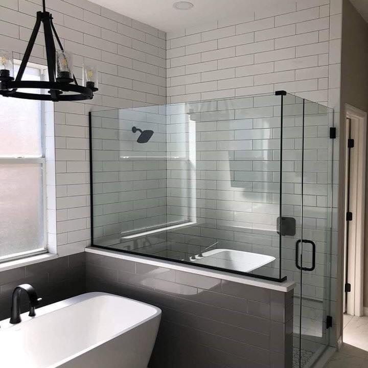 a white bath tub sitting next to a window