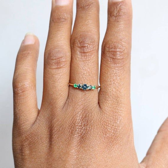 14K Gold Promise Ring, Emerald Ring, Dainty Wedding Ring, Round 5 Gemstone Engagement Ring, London Blue Topaz Band Ring For Her, Trio Ring, Stackable RingProduct info:14k solid goldEmerald- 0.21ct, NaturalBlue Topaz: 0.12 ct, NaturalRing Size 7Item will be resized and shipped within 10 days.ITEM Will BE SHIPPED : India Speed PostTo get the item in 4-5 days, we can also ship it thru DHL express, please contact us before.Please select your size at the drop down menu.Thanks!♥Shipping Policy,:Proces Sapphire Multi-stone Diamond Promise Ring, Sapphire Birthstone Ring In 14k Gold For Wedding, Fine Jewelry Sapphire Ring For Promise, May Birthstone, May Birthstone Sapphire Wedding Ring In Fine Jewelry, Rose Cut Diamond Sapphire Birthstone Ring For Wedding, Sapphire Birthstone Ring With Rose Cut Diamonds For Wedding, Sapphire Wedding Ring May Birthstone Fine Jewelry, Fine Jewelry Topaz Promise Ring For May Birthstone, Three Stone Blue Topaz Sapphire Promise Ring