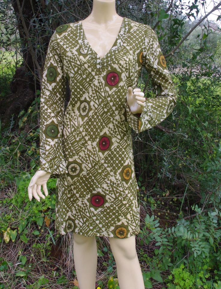 Boho Tunic Cotton Tunic Ethnic Tunic Tribal Tunic Tunic Dress Tunic Tops Faerie Clothing Bohemian Tunic Womens Tunic Summer Dress. Pretty and confortable Tunic  made of pure cotton . Excellent Fit ! Available :  S /M  M / L Approximate Measurements :    S / M Bust Width : 37"   ( 94 cm ) circumference Sleeves  : 27.6"  ( 70 cm )   Shoulder to shoulder : 16.9" ( 43 cm )  Tunic Length : From neck to bottom  35.8"  ( 91 cm )   M / L Bust Width : 37.8"  (  96 cm ) Sleeves : 24"   ( 61 cm ) Shoulder to shoulder : 16.9"  ( 43 cm ) Tunic Length : From neck to bottom  35.4"   ( 90 cm )   ★ Care:Care: Hand wash then hang dry, Hand made item which may contain tiny imperfections Don't hesitate to contact me with any inquiries or to see more photos, ♥ Thanks for visiting!♥ Printed Bohemian Tunic Boho Dress, Hippie Boho Tunic Dress With Floral Print, Bohemian Spring Dresses With Ikat Print, Green Floral Print Boho Hippie Dress, Bohemian Ikat Print Dress For Spring, Bohemian Ikat Print Spring Dresses, Patterned Bohemian Tunic Dress, Bohemian Tunic Dress In Patterned Color, Bohemian Patterned Tunic Dress