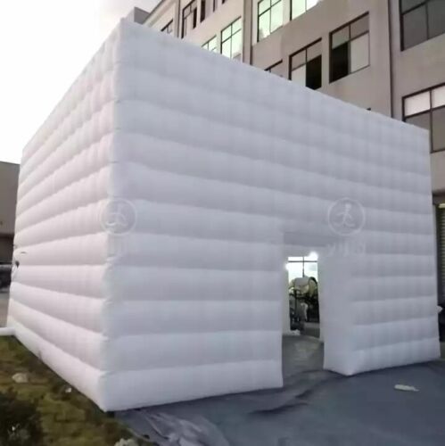 an inflatable structure is on the ground near a building