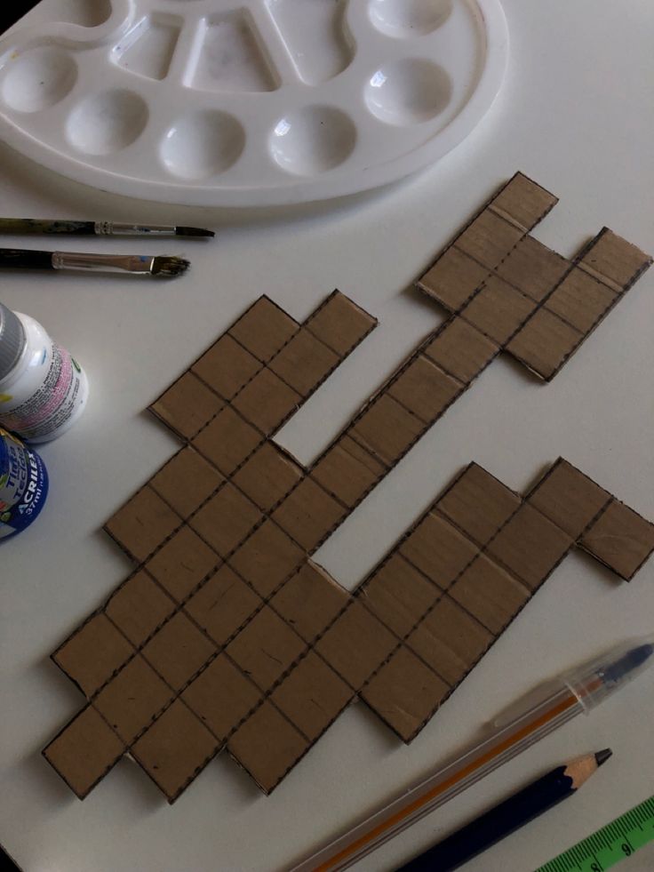 some crafting supplies are laid out on a table