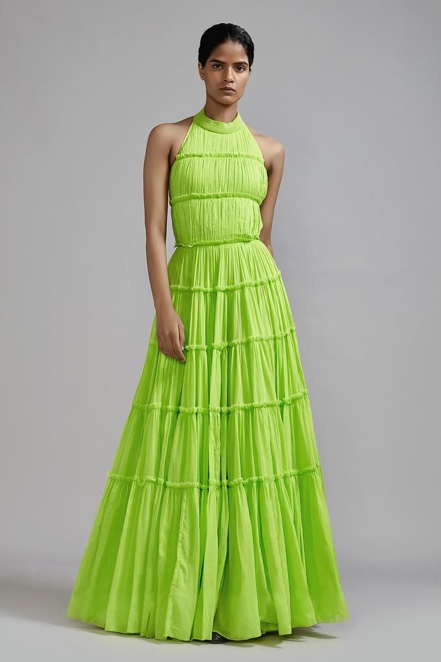 Neon green multi tiered gown with ribbed-neckline, tie at the back and side pockets.
Components: 1
Pattern: Plain
Neckline: Band Collar
Sleeve Type: Sleeveless
Fabric: 100% Cotton
Color: Green
Other Details: 
Handspun
Backless with tie-ups
Length: 55 inches
Closure: Back buttons
Occasion: Cocktail - Aza Fashions Tiered Gown, Backless Gown, Eco Friendly Clothing, Clothing Material, Ethical Clothing, Band Collar, Ribbed Neckline, Sustainable Clothing, Pink Fabric