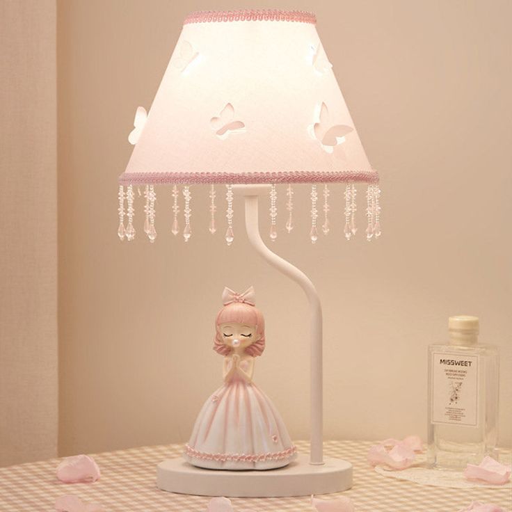 Cute cartoon children's room bedroom bedside table lamp high-end and high-looking decorative night lightProduct Details -Name: Bubble Princess Table Lamp -Material: iron+cloth+resin -Size: 24*18*43cm -Color: pink, light blue,blue -Light source: E27 -Voltage: 110~240V -Power: 5W -Packaging: 1/packRecommended to buy Cute Flower Table Lamp Walnut Page Turning Clock Ballerina Lamp, Princess Lamp, Pink Lamps, Princess Table, Pink Lamp, Decorative Night Lights, Princess Bedroom, Kids Bedroom Inspiration, Bedside Table Lamp