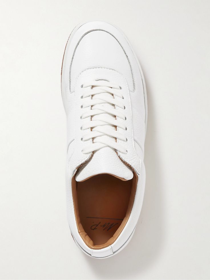 DESIGNED BY MR PORTER. As The Journal says, "Every man’s footwear rotation should contain a pair of white sneakers for one simple reason: they can be worn with absolutely anything". Mr P.'s 'Atticus' version is made from full-grain leather with tonal laces and lightweight rubber soles. Lower Impact Materials. This product is made using at least 50% lower-impact materials or ingredients. Find out more about our Consciously Crafted criteria here. Classic White Custom Sneakers For Light Sports, Sporty White Golf Shoes With Rubber Sole, Classic Low-top Custom Sneakers For Light Sports, Modern White Custom Sneakers With Contrast Sole, Modern Custom White Sneakers With Textured Sole, Modern White Custom Sneakers With Textured Sole, White Custom Sneakers For Light Sports With Rubber Sole, Classic High-top Sneakers With White Sole For Light Sports, White High-top Sneakers With Gum Sole For Light Sports