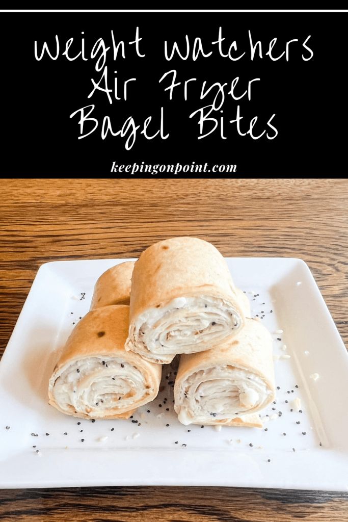 a white plate topped with two wrappers on top of a wooden table and text overlay reads weight watchers air fryer bagel bites