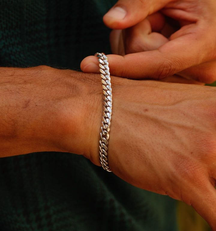 Men's Cuban Chain Bracelet – Rellery Stainless Steel Cuban Link Bracelet With Curb Chain, Classic Cuban Link Chain Bracelet With Adjustable Chain, Everyday Cuban Link Chain Bracelet With Solid Links, Everyday Jubilee Bracelet With Cuban Link, Stainless Steel Cuban Link Curb Chain Bracelet, Silver Cuban Link Bracelet With Adjustable Chain, Cuban Link Chain Bracelet With Solid Link Construction, White Gold Cuban Link Bracelet With Solid Links, White Gold Cuban Link Bracelet