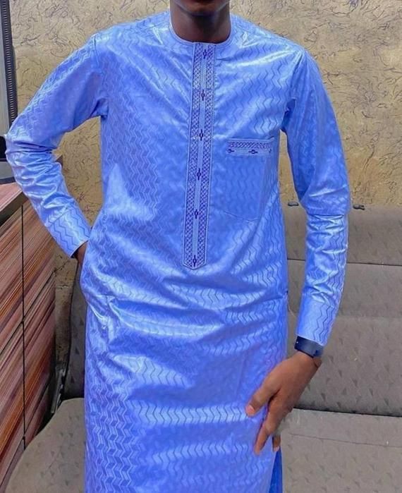 Mens africa wear is a handmade product . Luxury wear for any outings. Traditional marriage, birthday party or any occasion is lovely for this attire.  MADE TO ORDER > ensure you provide your real measurements. And  we will custom make it to fit your body. NB: when ordering your bazin the pattern Formal Long Sleeve Kurta With Traditional Patterns, Blue Traditional Formal Agbada, Traditional Fitted Thobe For Party, Elegant Long Sleeve Agbada With Traditional Patterns, Formal Blue Long Sleeve Agbada, Traditional Blue Thobe For Party, Fitted Long Sleeve Agbada For Festive Occasions, Traditional Fitted Agbada With Long Sleeves, Blue Semi-formal Traditional Wear With Long Sleeves