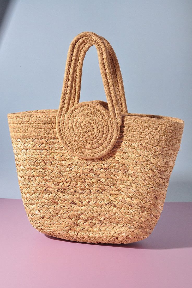 Get ready to slay this summer with the Santa Elena Tote! This chic woven bag in a natural color is the perfect accessory for all your summer adventures. With dimensions of 16"H, 14"W, and 2.5"D, it's the perfect size to carry all your essentials. Stay stylish and on-trend with this must-have tote. Beige Braided Tote Bag, Casual Braided Bag For Everyday Use, Casual Everyday Braided Bags, Casual Natural Braided Bags, Casual Braided Natural Color Bags, Casual Braided Jute Bag, Summer Braided Bags For Everyday Use, Braided Bucket Bag For Everyday Use, Rectangular Braided Bag For Everyday