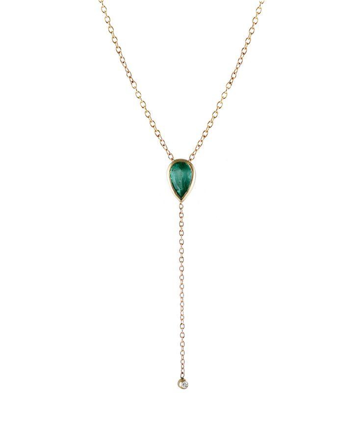 14k solid gold Length: 16" Drop: 1.5" 5x3mm Emerald Approximate emerald weight: .21 ctw 1.5 mm White diamond Approximate diamond weight: .015 ctw Elegant Adjustable Green Lariat Necklace, Emerald Drop Jewelry With 17 Jewels, Formal Lariat Jewelry With Single Cut Diamonds, Dainty Emerald Jewelry With Adjustable Chain, Green 14k Gold Jewelry With Single Cut Diamonds, Green Lariat Jewelry With Adjustable Chain, Green Lariat Jewelry For Formal Occasions, Formal Green Lariat Jewelry, Yellow Gold Long Drop Diamond Jewelry