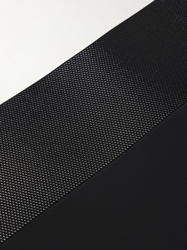 a close up view of the side of a black surface