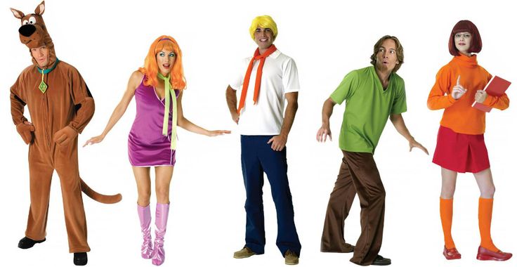 four people in costumes standing next to each other