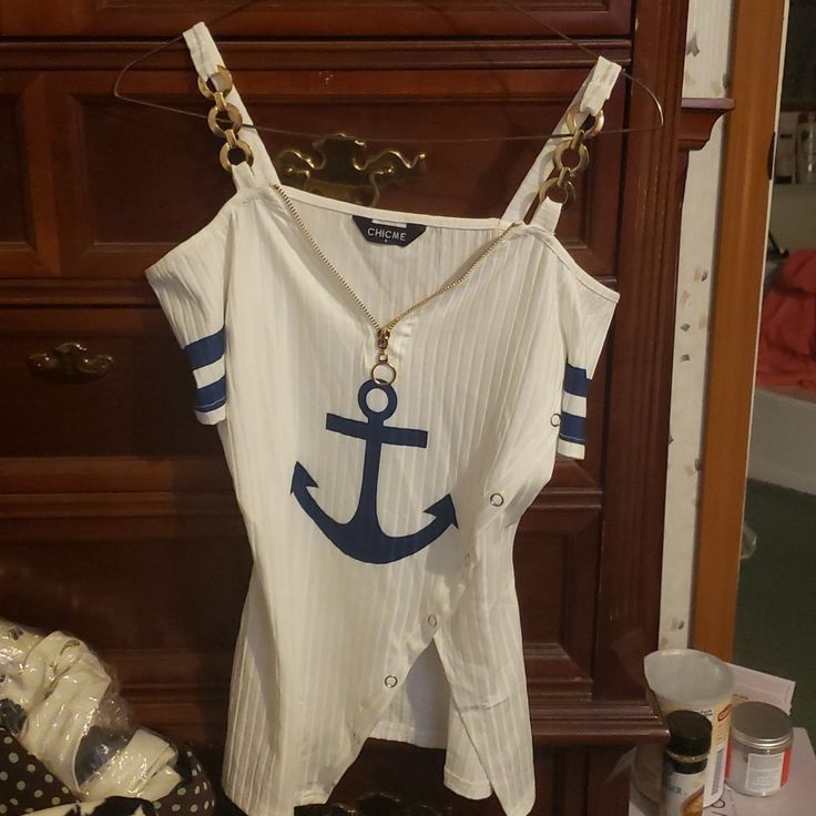 Nib Nautical Off The Shoulder Top. White With Blue Anchor. Gold Zipper And Shoulder Detail. Pit To Pit 16 Waist Across 17 Neck To Bottom 19 White Sailor Top For Summer, Nautical Beach Tops For Summer, Nautical Tops For Beach In Summer, Nautical Style Beach Tops For Summer, Nautical Blue Top For Beach, White Nautical Tops For Spring, White Nautical Tops For Vacation, Blue Anchor, Off The Shoulder Top