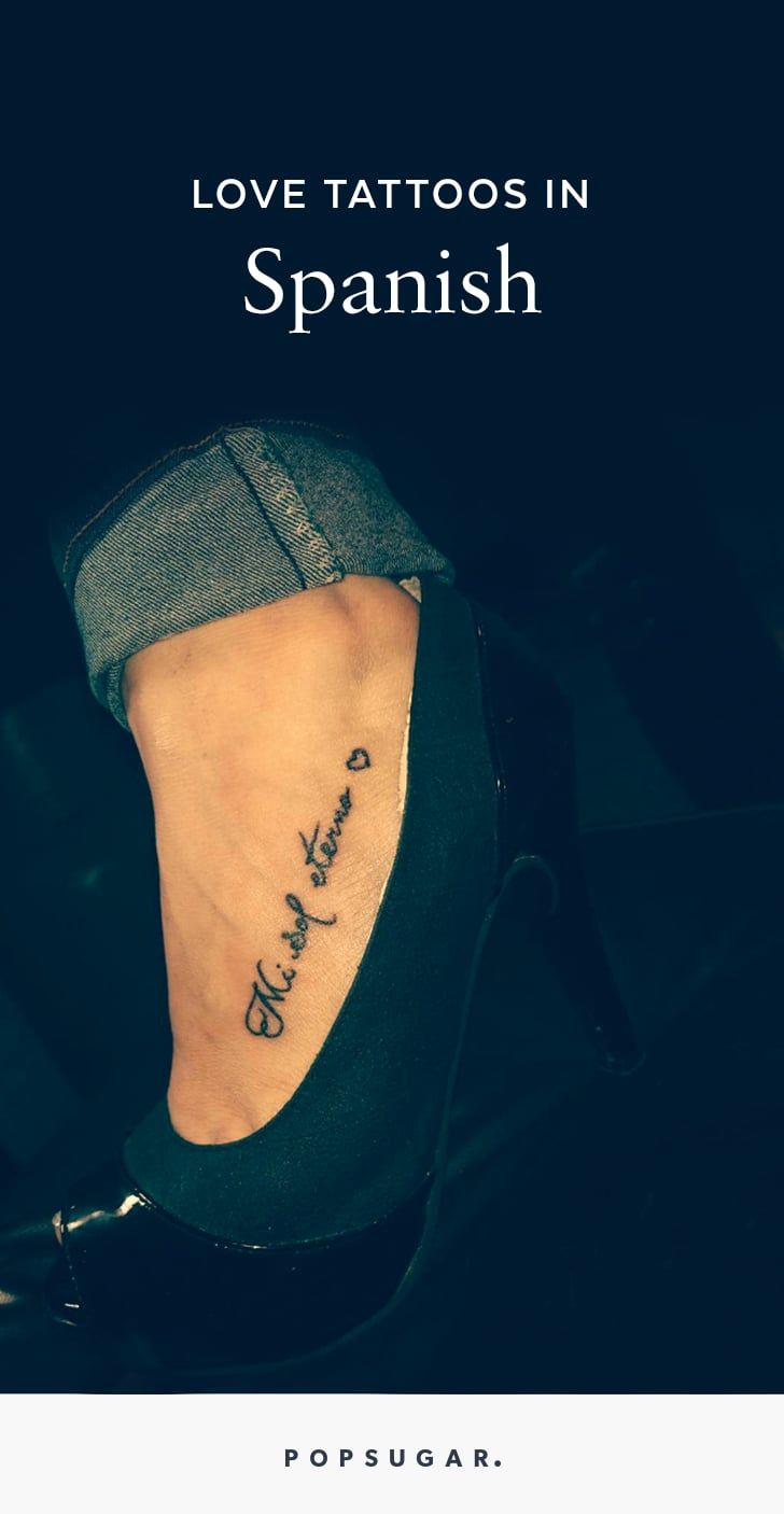 a woman's foot with the words love tattoos in spanish