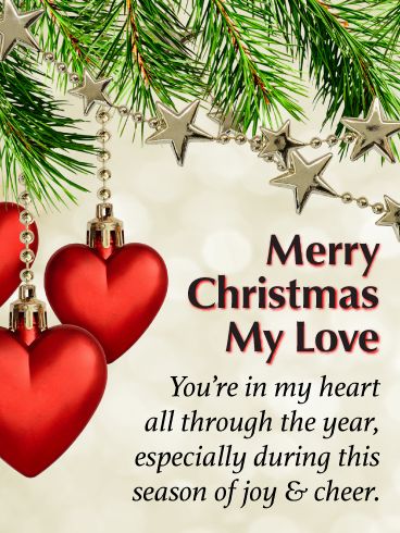 merry christmas card with two red hearts hanging from a tree branch and the words, you're in my heart all through the year, especially during this season of joy & cheer