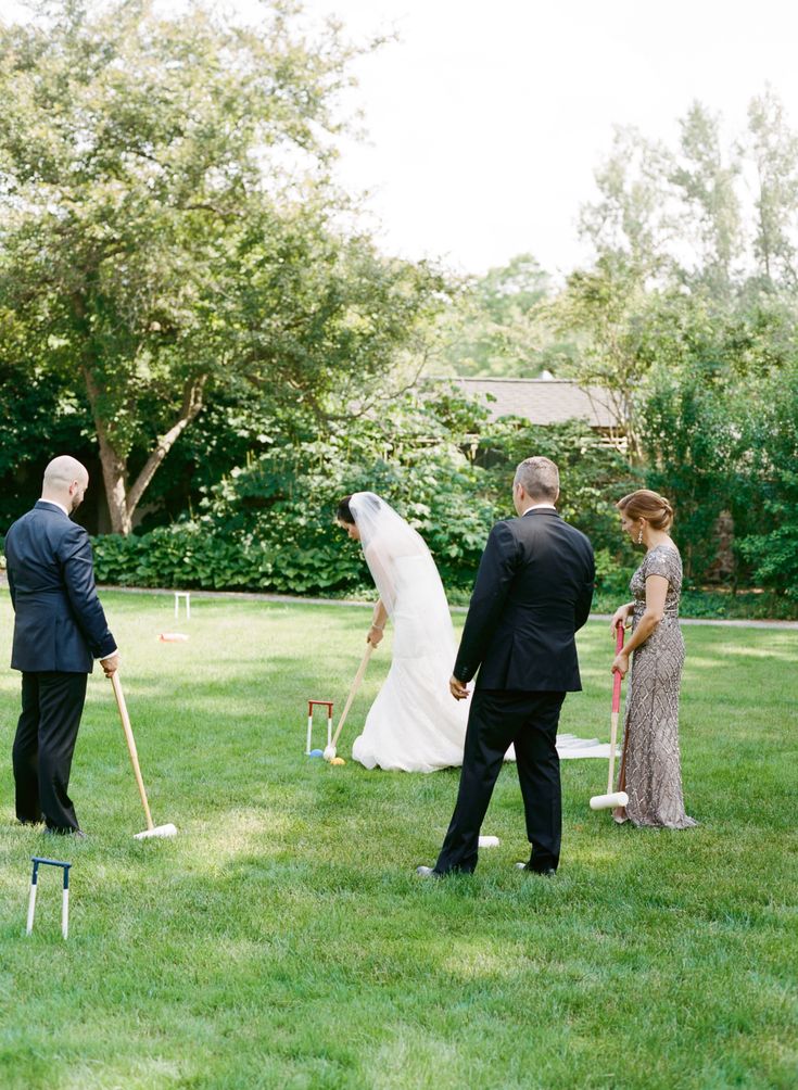 the bride and groom are getting ready to walk down the aisle at their outdoor ceremony