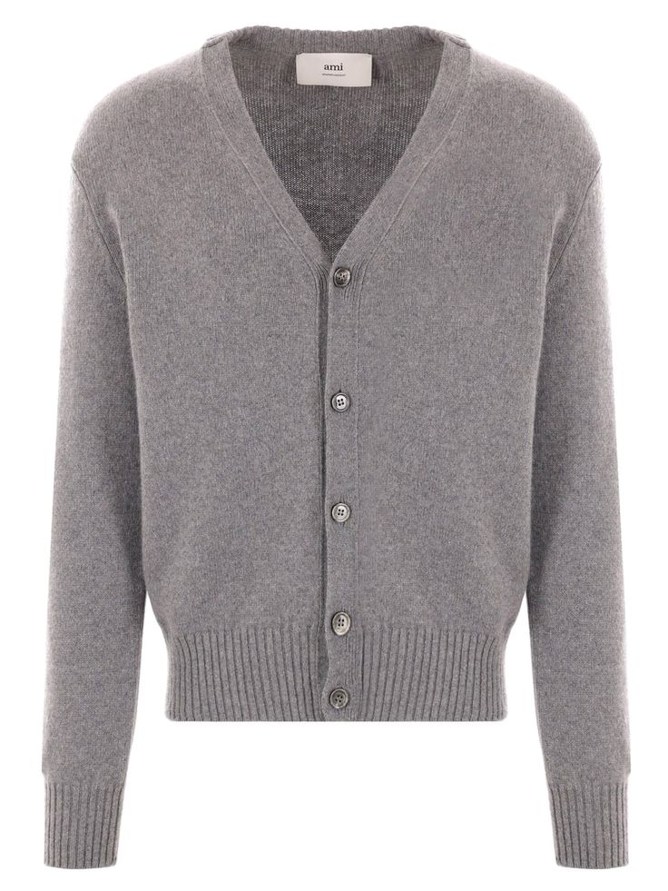 Grey cashmere-wool blend cardigan, knitted construction, signature Ami de Coeur monogram motif, V-neck, front button fastening, long sleeves, ribbed cuffs and hemComposition: Cashmere, 97% , Wool, 3% Designer V-neck Cardigan With Button Closure, Luxury V-neck Outerwear With Button Closure, Fall Cashmere V-neck Sweater With Button Closure, Classic Merino Wool Cardigan With Ribbed Cuffs, Classic V-neck Cardigan With Button Cuffs, Designer Fine Knit Sweater For Winter, Luxury V-neck Sweater For Fall, Designer V-neck Cardigan For Work, Classic Cashmere Cardigan With Button Closure