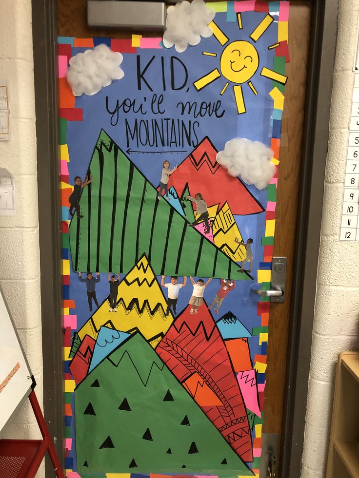 a door decorated with colorful mountains and the words kid, you're more mountains