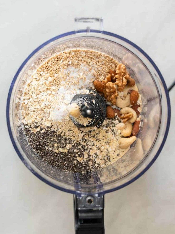 a blender filled with nuts and other ingredients