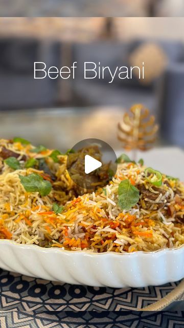 a video showing how to make beef biriyani in a casserole dish