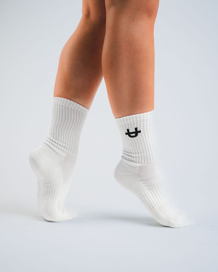 Step in style from the gym to the streets in UPPPER’s Original Off White Crew Socks. Designed to bring comfort to your workout and beyond with cushioning on the sole and ribbed panel for extra arch support, while preventing sweat buildup to keep your feet fresh and cool. So sporty, so on trend. Wear UPPPER Original Off White Crew Socks tall or scrunched with leggings or shorts and your favorite sneakers, and then you’re ready to conquer your day. This product cannot be returned for hygiene reasons. Features Moisture-wicking to keep feet fresh from the gym to the streets. Breathable to prevent sweat build-up. Incredibly soft and gentle on the skin. Cushioned sole for added comfort. Ribbed panel through the middle of the foot for extra arch support. Specifications Color: Off White Pack of th White Crew Socks, Barbell Pad, Gym Look, Card Workout, Ribbed Paneling, Knee Sleeves, Fitness Gear, Wrist Wrap, Soft And Gentle