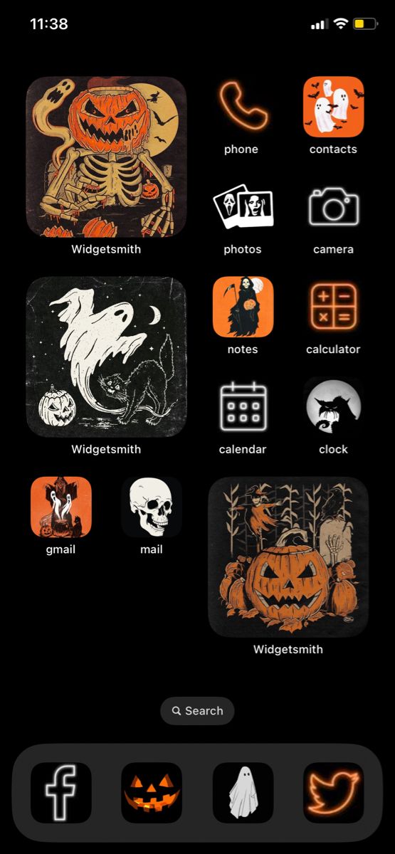 an iphone screen with halloween icons on it