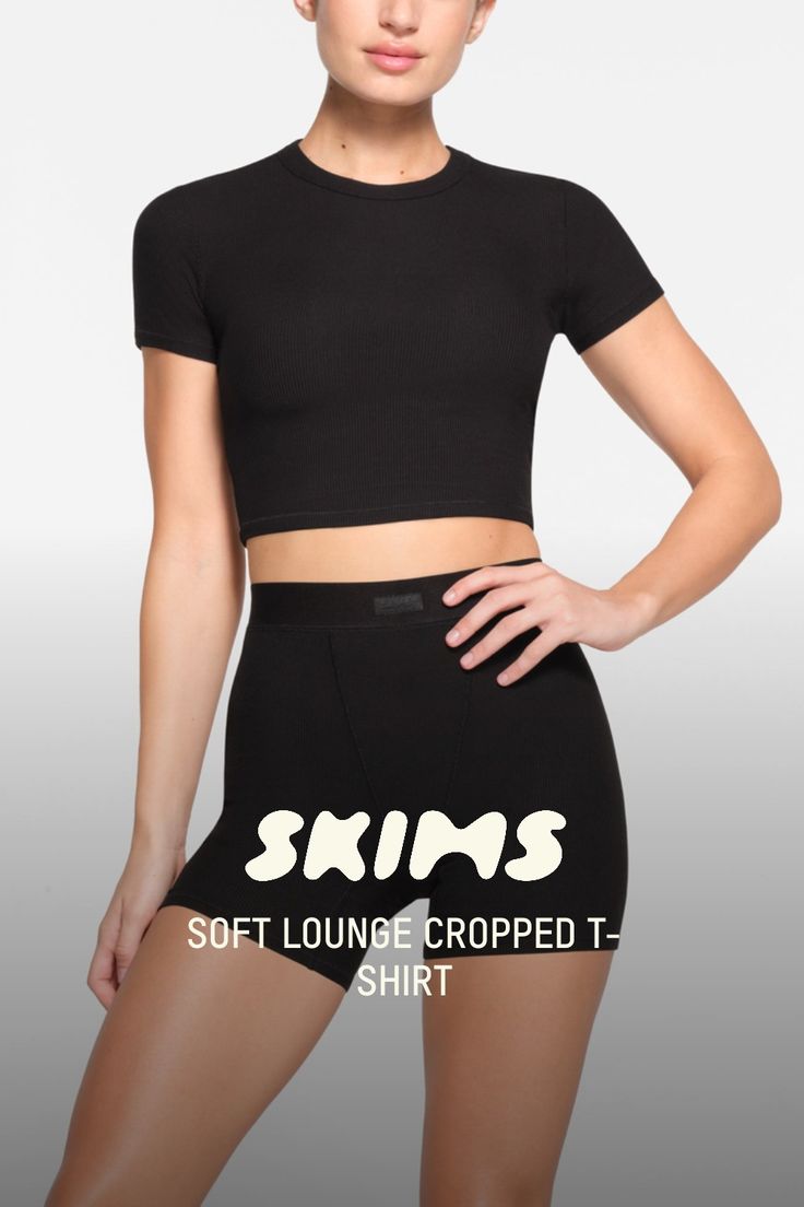 This flattering, ribbed cropped t-shirt keeps you comfortable and cool while lounging and beyond. Features a crew neckline. Pair with coordinating Soft Lounge bottom. Fits true to size. | SKIMS Cropped T-Shirt | Black | 4XL | Soft Lounge Seamless High Stretch Loungewear Tops, Seamless High Stretch Tops For Loungewear, Seamless High Stretch Top For Loungewear, Fitted Crew Neck Top For Lounging, Stretch Crew Neck Tops For Lounging, Black Fitted Tops For Lounging, Fitted Black Top For Lounging, Sporty Stretch Tops For Lounging, Seamless Snug Fit Tops For Loungewear