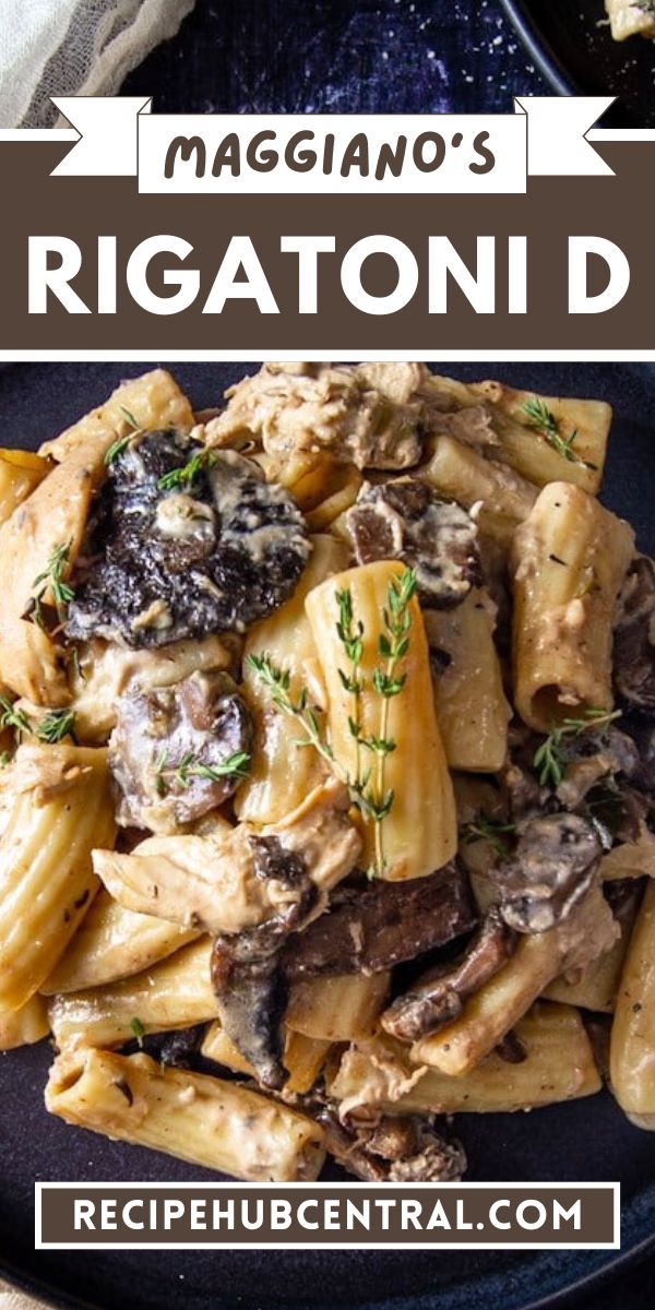 a black plate topped with pasta and mushrooms