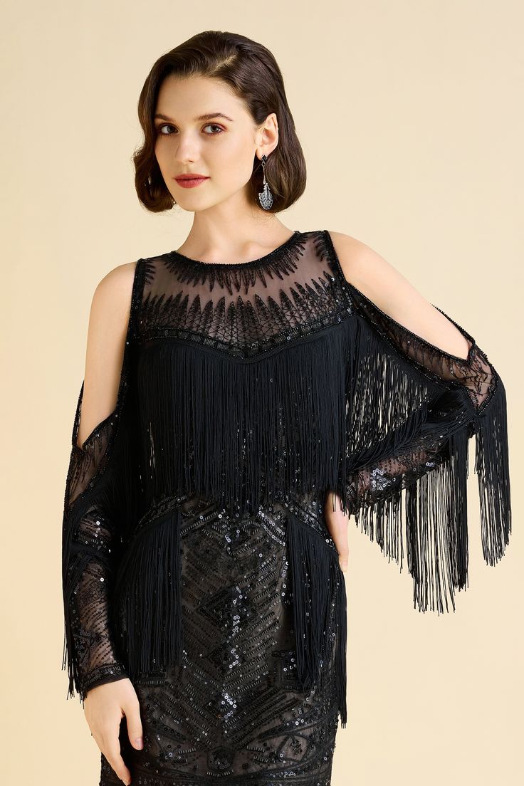 The sheer neckline offers a glimpse of subtle sensuality, elegantly framing the face and collarbone. Long sleeves, adorned with playful fringe, cascade gracefully, enhancing your movements with every step. Fringed sides at the waist create a flattering silhouette, emphasizing your figure while adding a touch of vintage glamour. Intricate beadwork adds a layer of luxury and craftsmanship, creating a mesmerizing effect that captures the light and draws admiration. Features: Off-shoulder design See Flapper Dress With Beaded Fringe For Night Out, Night Out Flapper Dress With Beaded Fringe, Gatsby Style Beaded Fringe Flapper Evening Dress, Gatsby Style Beaded Fringe Flapper Dress For Evening, Elegant Fringe Evening Dress For Party Season, Glamorous Black Beaded Fringe Flapper Dress, Elegant Tasseled Evening Dress, Beaded Fringe Flapper Dress For Cocktail, Glamorous Beaded Fringe Flapper Dress For Gala