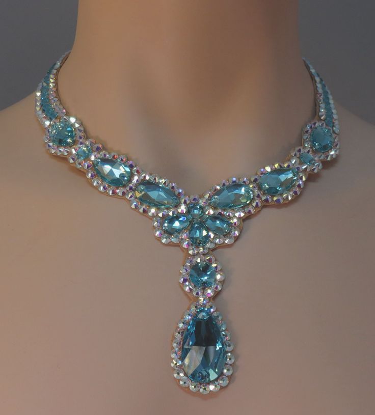 Elegant Turquoise Jewelry With Rhinestones, Party Turquoise Necklace With Rhinestones, Blue Crystal Necklaces With Bling, Turquoise Jeweled Necklace For Party, Teardrop Crystal Necklaces With Stones, Teardrop Crystal Necklace With Stones, Elegant Turquoise Crystal Necklaces For Jewelry Making, Jeweled Teardrop Necklaces For Wedding, Crystal Teardrop Pendant Necklace With Rhinestones