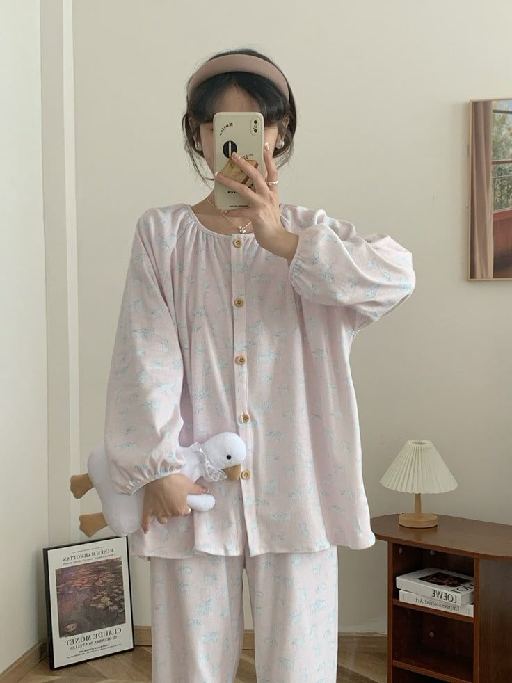 Immerse yourself in comfort and whimsical charm with our Pink Doll Kitty Long Sleeves and Pants Pajama Set. Crafted with meticulous attention to detail, this delightful ensemble features an enchanting doll kitty motif adorning both the long-sleeved top and coordinating pants. Perfect for lounging around the house or enjoying a peaceful night's sleep, our Pink Doll Kitty Pajama Set combines style and comfort effortlessly. Treat yourself to a touch of whimsy with this charming addition to your sleepwear collection. 100% Cotton Relax Fit (stretchy waistband) Breathable (great for all seasons) Machine Safe (gentle - cold setting, please hang dry when possible) General Size Guide: Size S/M -> Size 0 - 4 Size M/L-> Size 4 - 8 Size L/XL -> Size 8 - 12 Looking for more coziness? Shop our loungewea Cute Nightwear, Princess Pajamas, Women Nightwear Dresses, Cotton Night Dress, Night Suit For Women, Stylish Bedding, Night Pajama, Pajama Fashion, Pajamas For Women