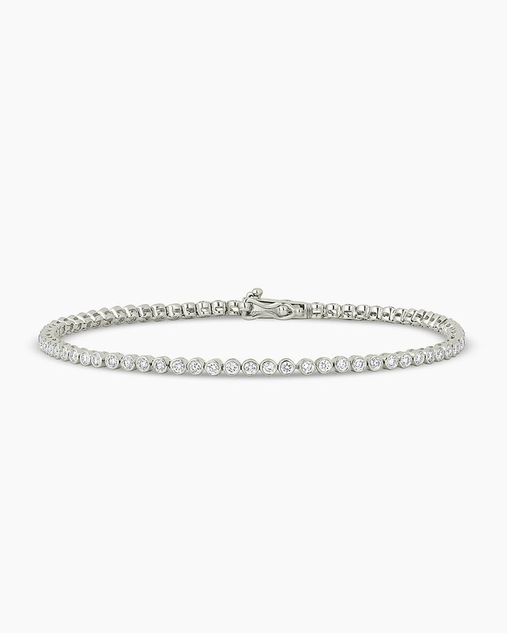 Classic Diamond Tennis Bracelet – gorjana Classic Stackable Jewelry Gift, Modern Cubic Zirconia Jewelry With Round Cut, Timeless Hoop Jewelry For Gifts, Timeless Hoop Jewelry Gift, Timeless White Jewelry With Diamond Accents, Modern Oval Stackable Jewelry, Silver Stackable Tennis Bracelet In Fine Jewelry Style, Stackable Silver Tennis Bracelet, Elegant 14k White Gold Round Band Jewelry