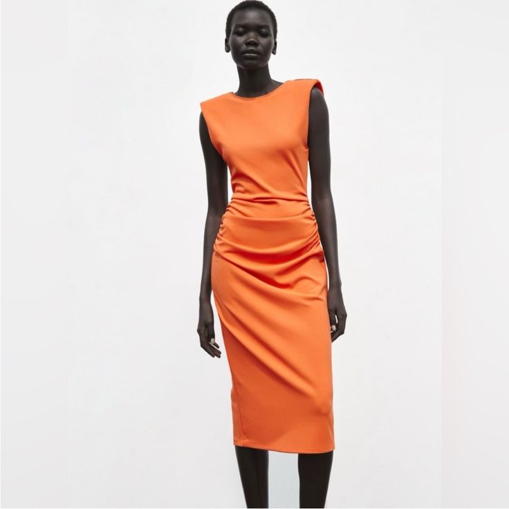 Padded Shoulders, Ruching On The Sides, V Back. Elegant Stretch Orange Dress, Elegant Orange Stretch Dress, Elegant Orange Stretch Midi Dress, Orange Midi Dress For Summer Workwear, Elegant Sleeveless Orange Midi Dress, Summer Orange Midi Dress For Workwear, Elegant Orange Sleeveless Midi Dress, Summer Workwear Orange Midi Dress, Elegant Orange Ruched Midi Dress