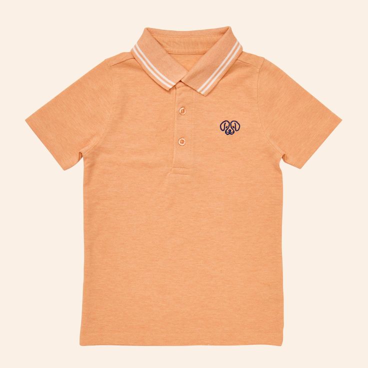 The Andre polo shirt is comfortable enough to play in all day but can also be worn for perhaps one of life’s dressier moments - think school picture day or brunch with grandma. The Andre polo shirt is made from our super soft pique knit and features a classic rib collar and cute embroidery at the chest. 93% Organic Cotton, 2% Recycled Polyester, 5% Spandex Preppy Cotton Polo Shirt For Spring, Preppy Cotton Polo Shirt For School, Orange Polo Shirt With Polo Collar For Summer, Summer Orange Polo Shirt With Polo Collar, Orange Polo Shirt With Collar For Summer, Summer Orange Polo Shirt With Collar, Preppy Polo Shirt With Polo Collar For Summer, Preppy Summer Polo Shirt With Polo Collar, Summer Cotton Polo Shirt For School