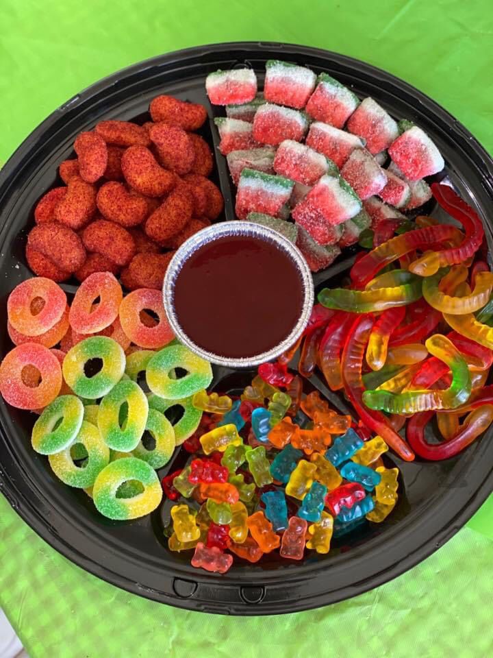 there is a plate with many different candies on it