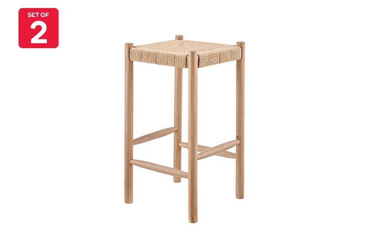 the stool is made from wood and has a wicker seat