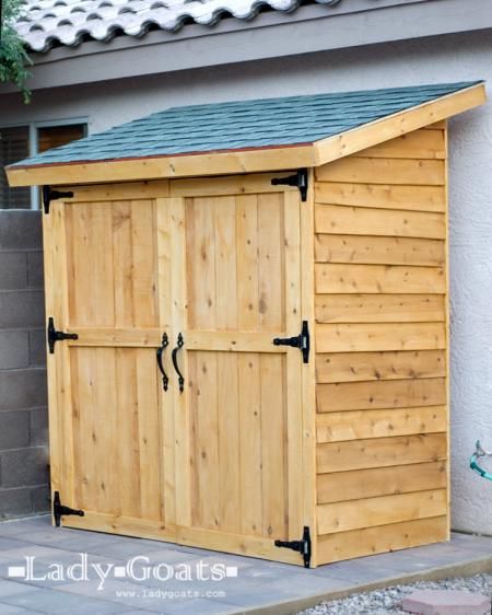 a wooden shed with the words how to make a storage shed on it's side