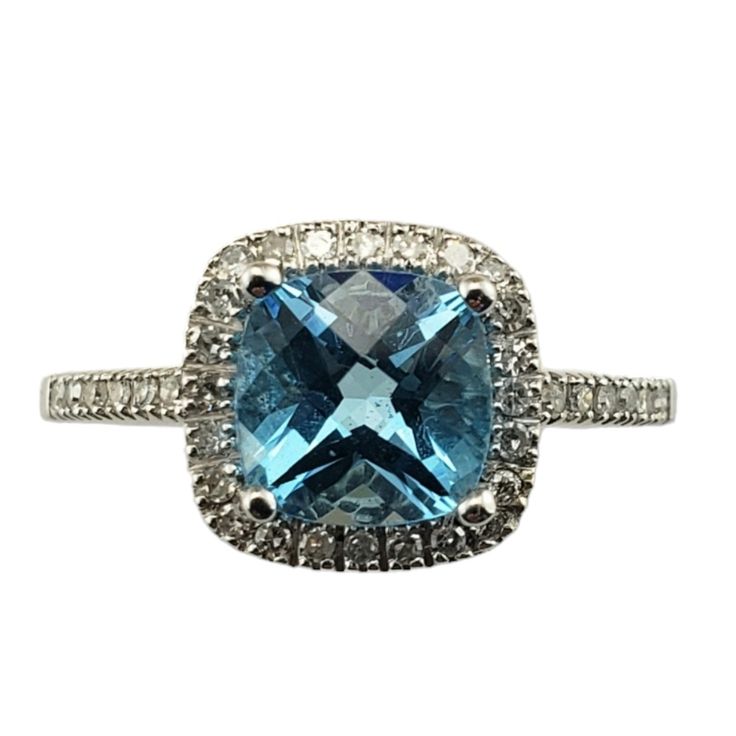 Vintage 14 Karat White Gold Blue Topaz And Diamond Ring Size 6.25- This Elegant Ring Features One Blue Topaz (7 Mm X 7 Mm) Surrounded By 36 Round Single Cut Diamonds Set In Classic 14k White Gold. Width: 10 Mm. Shank: 1.5 Mm. Approximate Total Diamond Weight: .20 Ct. Diamond Clarity: I1-I2 Diamond Color: H-I Ring Size: 6.25 Stamped: 14k Ema Weight: 2.6 Gr./ 1.6 Dwt. Very Good Condition, Professionally Polished. Will Come Packaged In A Gift Box Or Pouch (When Possible) And Will Be Shipped U.S. Priority Mail Insured. Dv102923/17kcs Jagi Id 10/17/23