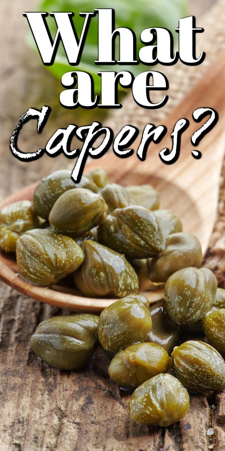 what are capers on a wooden spoon with the words, what are capers?