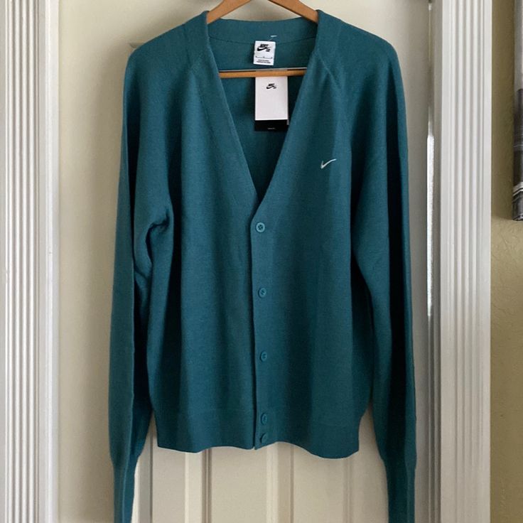 Nike Cardigan Unisex Brand New With Tags 49% Wool Chest 24” Length 26” Classic Green Cotton Cardigan, Nike Cotton Sweater For Fall, Classic Long Sleeve Cardigan For Daywear, Nike Winter Sweater, Classic Green Long Sleeve Cardigan, Nike Casual Spring Sweater, Casual Green Cardigan For Daywear, Casual Green Outerwear For Daywear, Nike Long Sleeve Cotton Outerwear