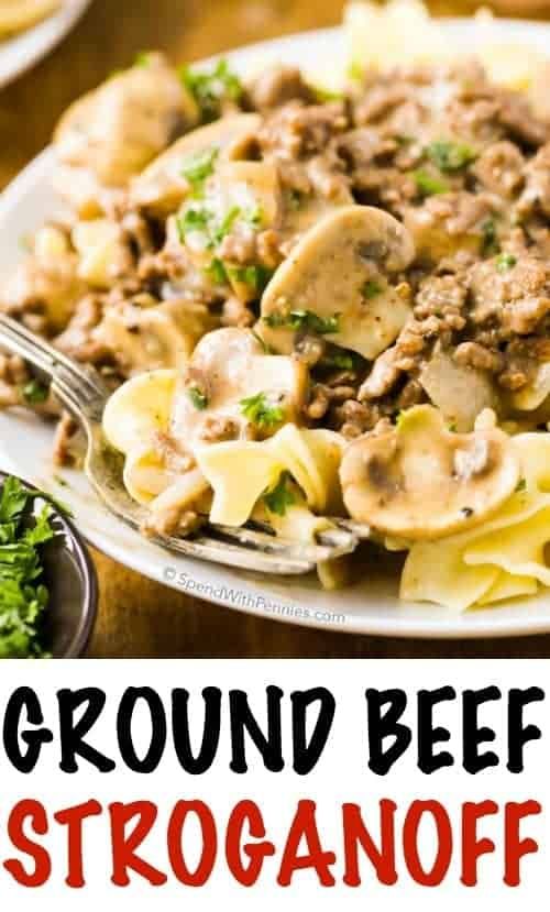 a plate of ground beef stroganoni on a white plate with a fork