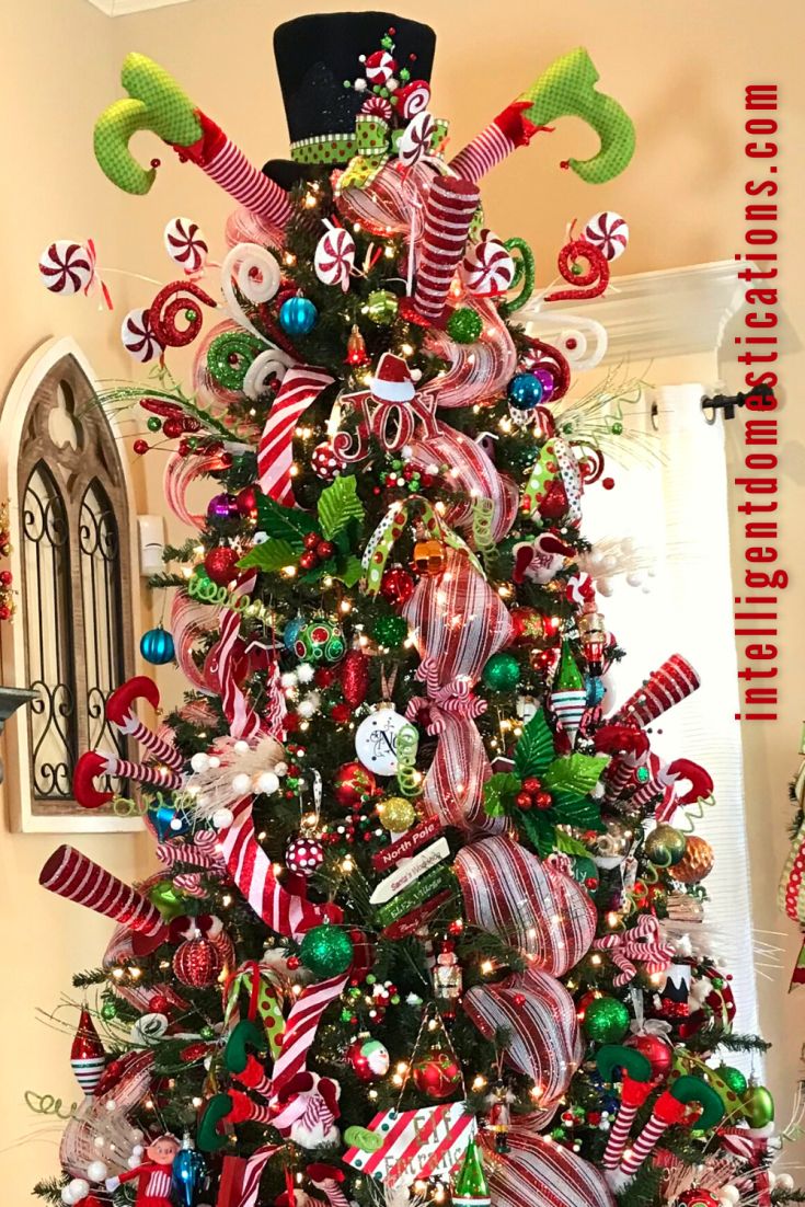 a christmas tree decorated with candy canes and ornaments