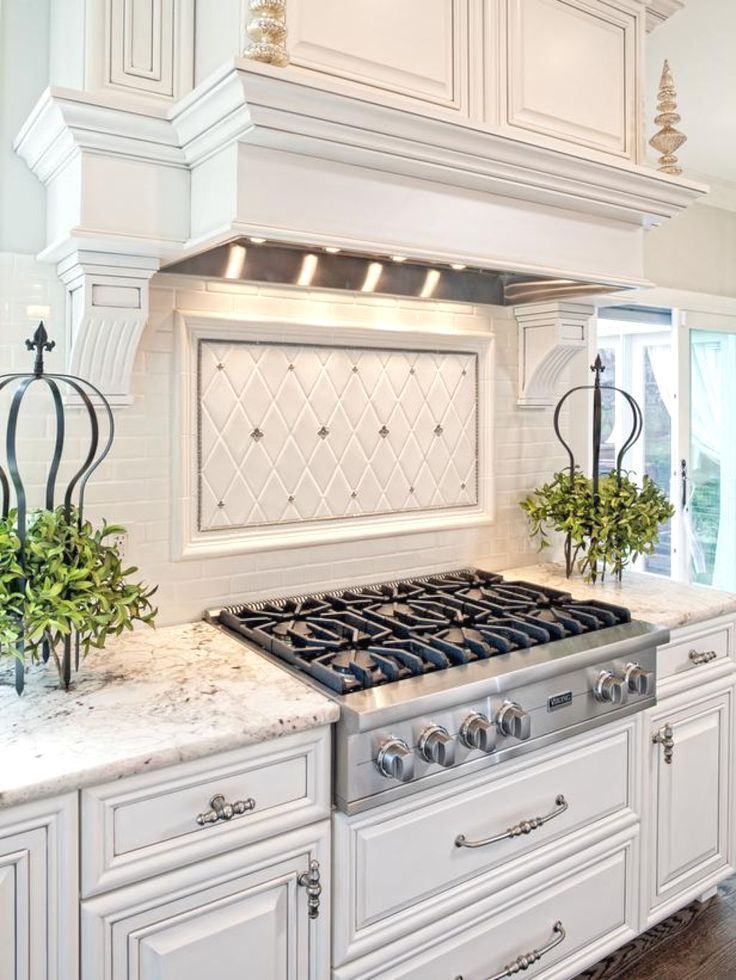 a kitchen with white cabinets and marble counter tops that has the words kitchen decoration above it