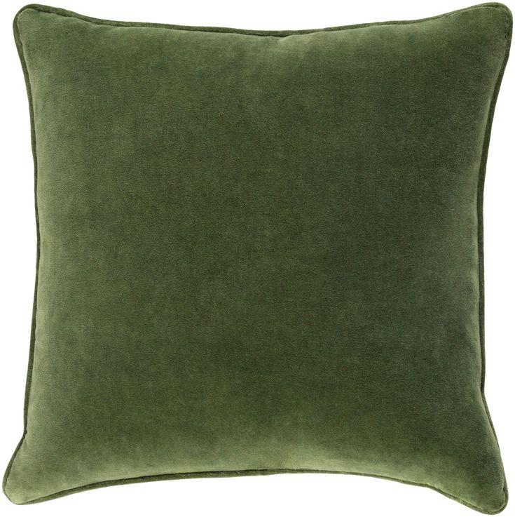 a green pillow on a white background