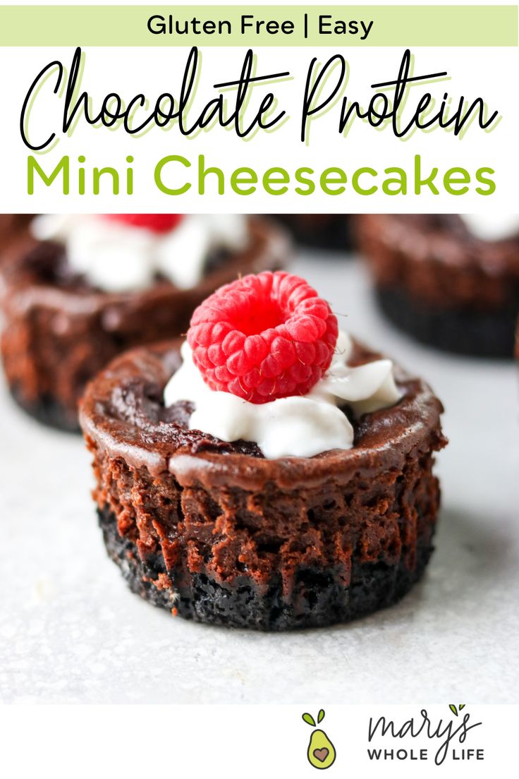 chocolate cupcakes with whipped cream and raspberries on top are ready to be eaten