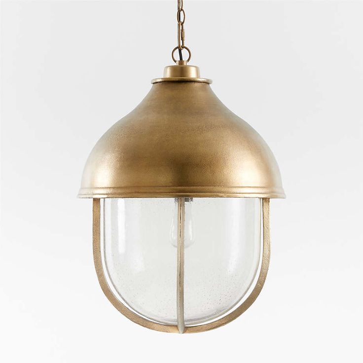 North Large Brass Cage Pendant Light by Leanne Ford + Reviews | Crate & Barrel Aged Brass Pendant Lighting, Brass Kitchen Pendant Lights Over Island, Pendant Lighting Stairwell, Coastal Pendant Lighting Kitchen, Brass Kitchen Pendants, Brass And Glass Pendant Light, Nautical Pendant Lighting, Antique Brass Pendant Light, Nautical Lights