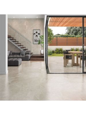 an open living room and dining area with sliding glass doors